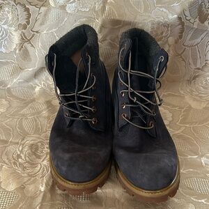 Men’s Timberland blue boots.